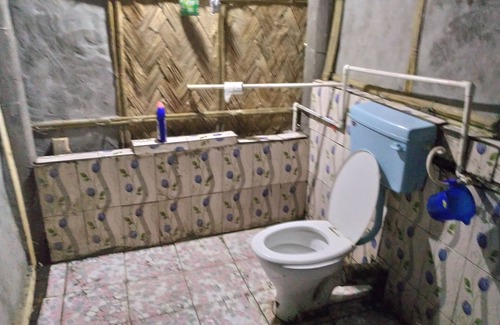 Jorhat Hotel | Jonki Panoi Bamboo Cottages