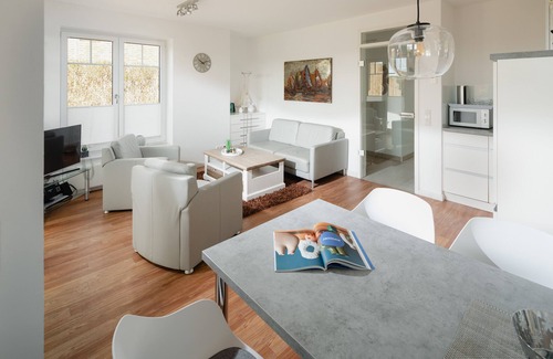 Juist Apartment | Juist - Exclusive apartment, fantastic location directly on the dike with garden/terrace