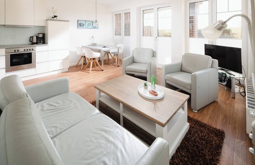 Juist Apartment | Juist - Exclusive apartment, fantastic location directly on the dike with garden/terrace