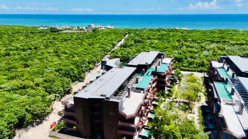 Playa Paraiso Apartment | Jungle Guardian - Rooftop Pool & Beach Club in Zona Hotelera Tulum