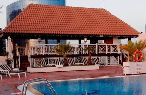 Al Muraqqabat House | Junior Suite Near Safeer Market By Luxury Bookings