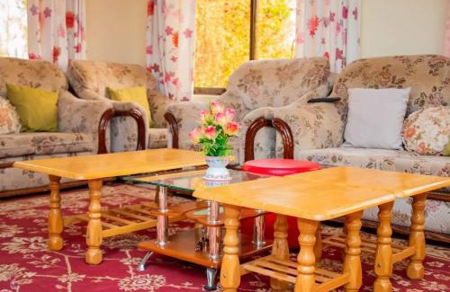 Muiga Hotel | Juniper Green Gardens Resort.