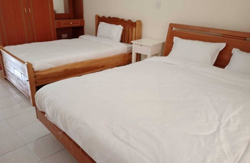 Muiga Hotel | Juniper Green Gardens Resort