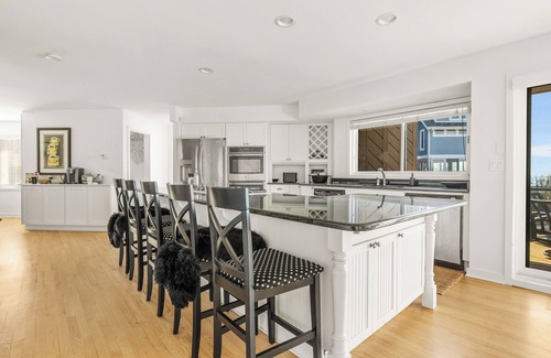 Grand Beach House | Juniper Presents: Luxurious Lakefront Vacay Home-Hot tub, Pool, Decks, Views