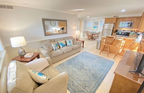 Cape May Condo | JUST ACROSS THE STREET FROM THE BEACH! PARK YOUR CAR & WALK! Granite countertops and stainless appliances. In ground pool at property.