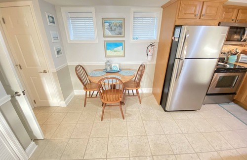 Cape May Condo | JUST ACROSS THE STREET FROM THE BEACH! PARK YOUR CAR & WALK! Granite countertops and stainless appliances. In ground pool at property.