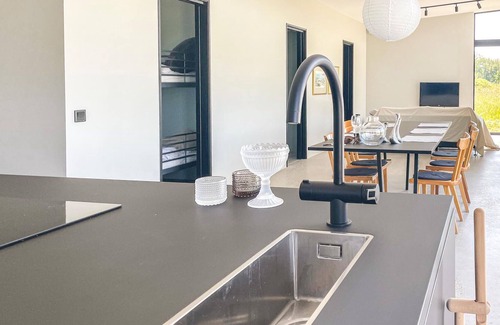 Sodvik House | Just one kilometer from the water, this modern and cozy cottage with a view of the Swedish nature aw