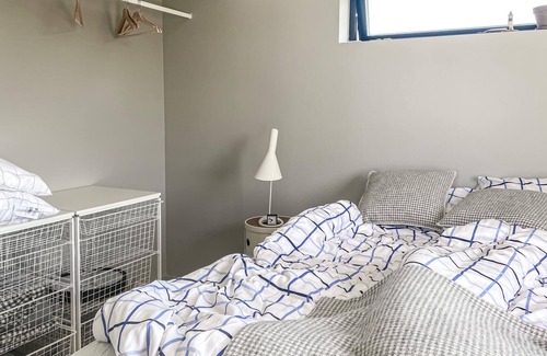 Sodvik House | Just one kilometer from the water, this modern and cozy cottage with a view of the Swedish nature aw