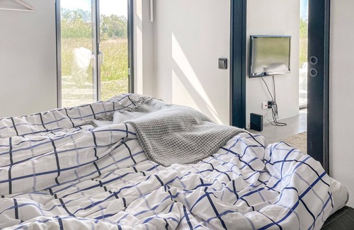 Sodvik House | Just one kilometer from the water, this modern and cozy cottage with a view of the Swedish nature aw