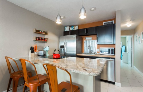 Sunset Beach Condo | Just steps to the white sandy beach!