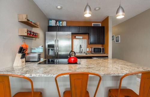 Sunset Beach Condo | Just steps to the white sandy beach!