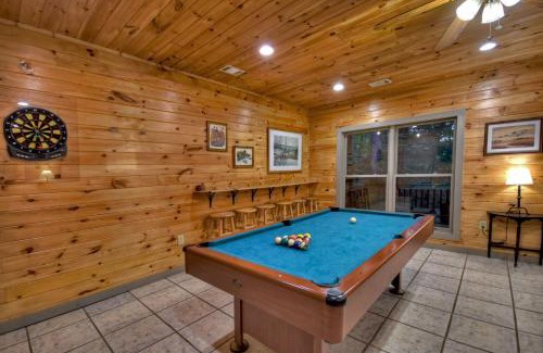 Cashes Valley Villa | K6 Lodge Gather around the firepit soak in the hot tub and splash in the creek