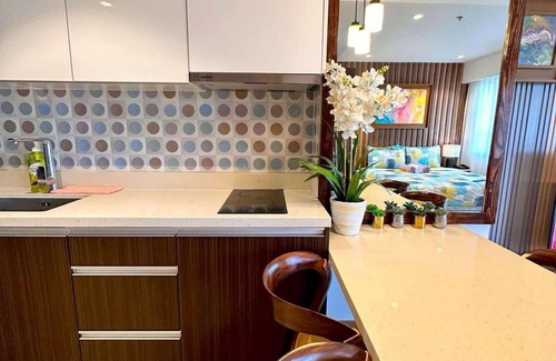 Maribago Condo | Kate & Keith's Place Deluxe Studio Suite at Tambuli Seaside Resort & Spa