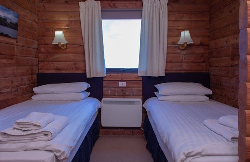 Armadale Ski Chalet | Keppoch Lodge - a cabin that sleeps 4 guests in 2 bedrooms