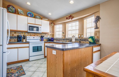 Breezeswept Beach Estates House | Key Blessing: Experience the Keys Life at This Charming 3BR Canal Front Home, Dockage & Dog-Friendly