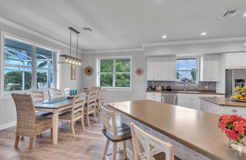 Marco Island House | KEY WEST STYLE 4-3 house, heated pool, deck, canal, outdoor kitchen & more