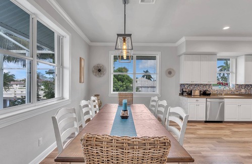 Marco Island House | KEY WEST STYLE 4-3 house, heated pool, deck, canal, outdoor kitchen & more