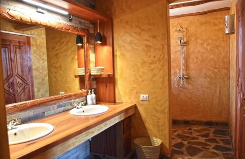 Tsavo East Cabin | KIBOKO RIVER CAMPnA LUXURIOUS ESCAPE IN THE WILDERNESS.
