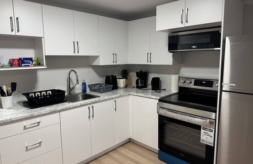 Moncton Apartment | Kick back and relax in this cozy and stylish space. Family and Pet-Friendly!