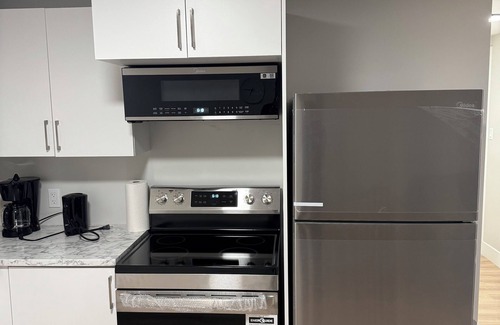 Moncton Apartment | Kick back and relax in this cozy and stylish space. Family and Pet-Friendly!