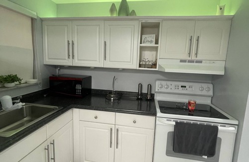 Sunrise Apartment | Kick back and relax in this calm, stylish space apartment with 1 bed 1 bath.n