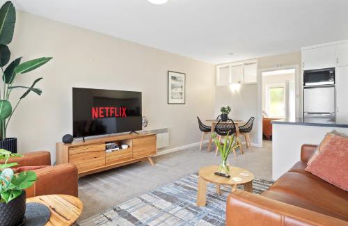 Hobart Central Business District Apartment | King Bed, Water Views, Private Parking, Courtyard Living in the Heart of Sandy Bay
