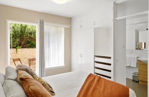 Hobart Central Business District Apartment | King Bed, Water Views, Private Parking, Courtyard Living in the Heart of Sandy Bay