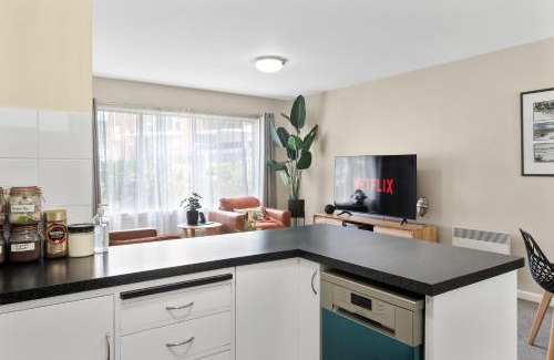 Hobart Central Business District Apartment | King Bed, Water Views, Private Parking, Courtyard Living in the Heart of Sandy Bay