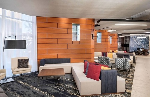 Greenville Downtown Apartment | King Comfort x2: Free WiFi, Indoor Pool, Steps from Bon Secours Arena