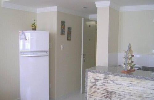 Pitangueiras Apartment | Kitchenette 70 meters from the beach Pitangueiras