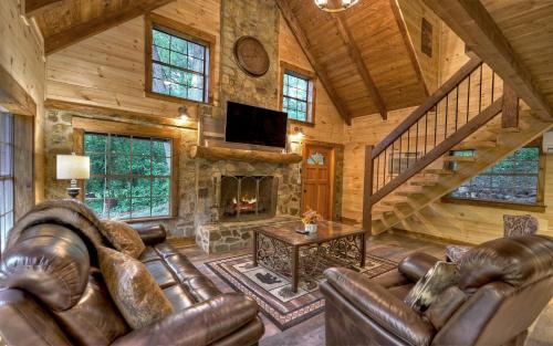 Morganton Villa | Knotty Creek Retreat Creek access firepit hot tub wood-burning fireplace