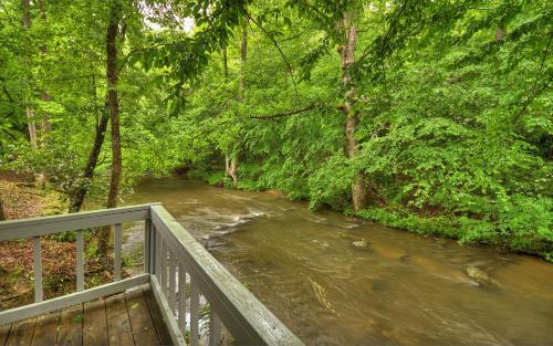 Morganton Villa | Knotty Creek Retreat Creek access firepit hot tub wood-burning fireplace