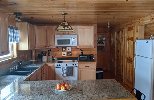 Oquossoc House | Knotty Pine Home- 2 Min Walk to Lake and Dock