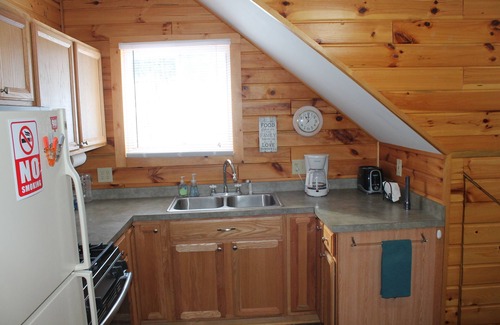Spruce Cabin | Knotty Pine Retreat at Hubbard Lake with private deeded lake access steps away