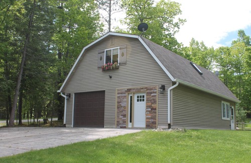 Spruce Cabin | Knotty Pine Retreat at Hubbard Lake with private deeded lake access steps away
