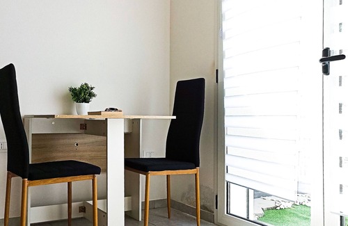 Cabras Apartment | Kolossoi GH - Apartment W/kitchen, living & courtyard