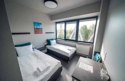 Grizinkalns Hotel | Komandu Sporta Spēļu Halles viesnīca