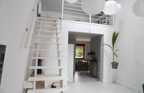 Barczewo Apartment | Komfortowe mieszkanie z antresolą i tarasem