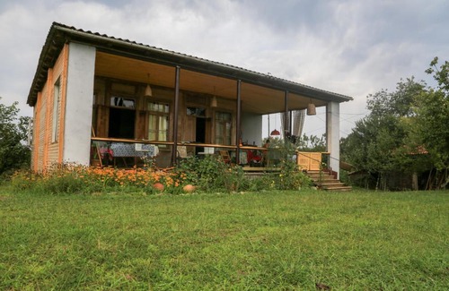 Khulo House | Komli - Rustic Historic Farmhouse with Mountain Views, surrounded by tea plantation, vines, bamboos and a rivulet