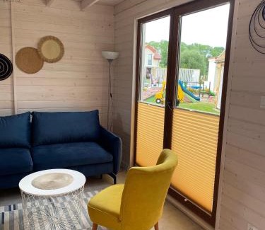 Sarbinowo Apartment | Koralia Domki i Apartamenty Basen z podgrzewaną wodą