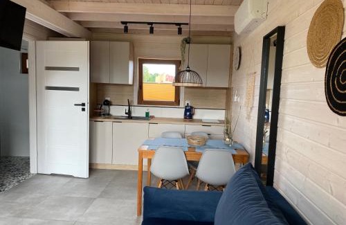 Sarbinowo Apartment | Koralia Domki i Apartamenty Basen z podgrzewaną wodą