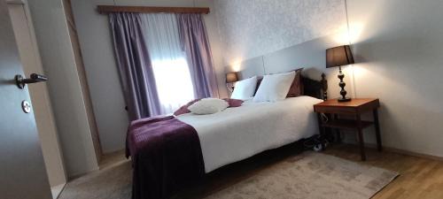 Rauma House | Kortteer Pinkki huone