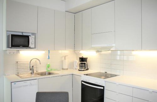 Tampere Apartment | Kotimaailma Apartments - saunallinen kolmio- Kaleva