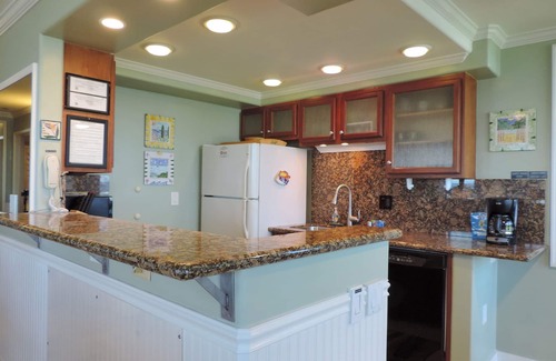 Poipu Condo | Kuhio Shores 119 - Two Bedroom Condo with White Water Ocean Views with A/C