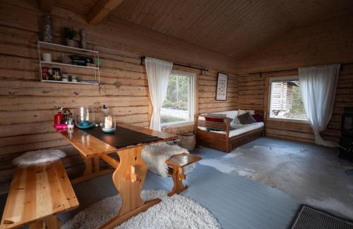 Ranua Ski Chalet | Kutulammen erämökki saunalla