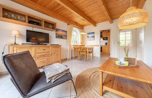 Tannenhausen House | Lüttje Huck - Ferienwohnung 3 mit Seeblick & Sauna