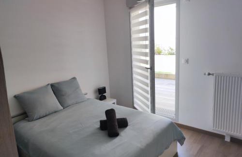 Faubourg-Raines Apartment | L'AuthentiCité, jardin et parking au centre-ville