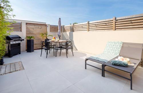 Le Somail Apartment | L'entre deux-suite romantique - jacuzzi privatif - clim réversible - wifi