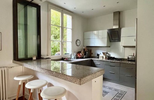 15th Arrondissement Apartment | "La Belle Époque: A Glamorous 1930s Art Deco Mansion with garden &Summer Lounge"