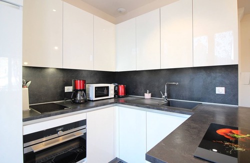 La Bourboule Apartment | La Bourboule: Elegant 2-Bedroom Apartment with Balcony, Parking, and Wi-Fi